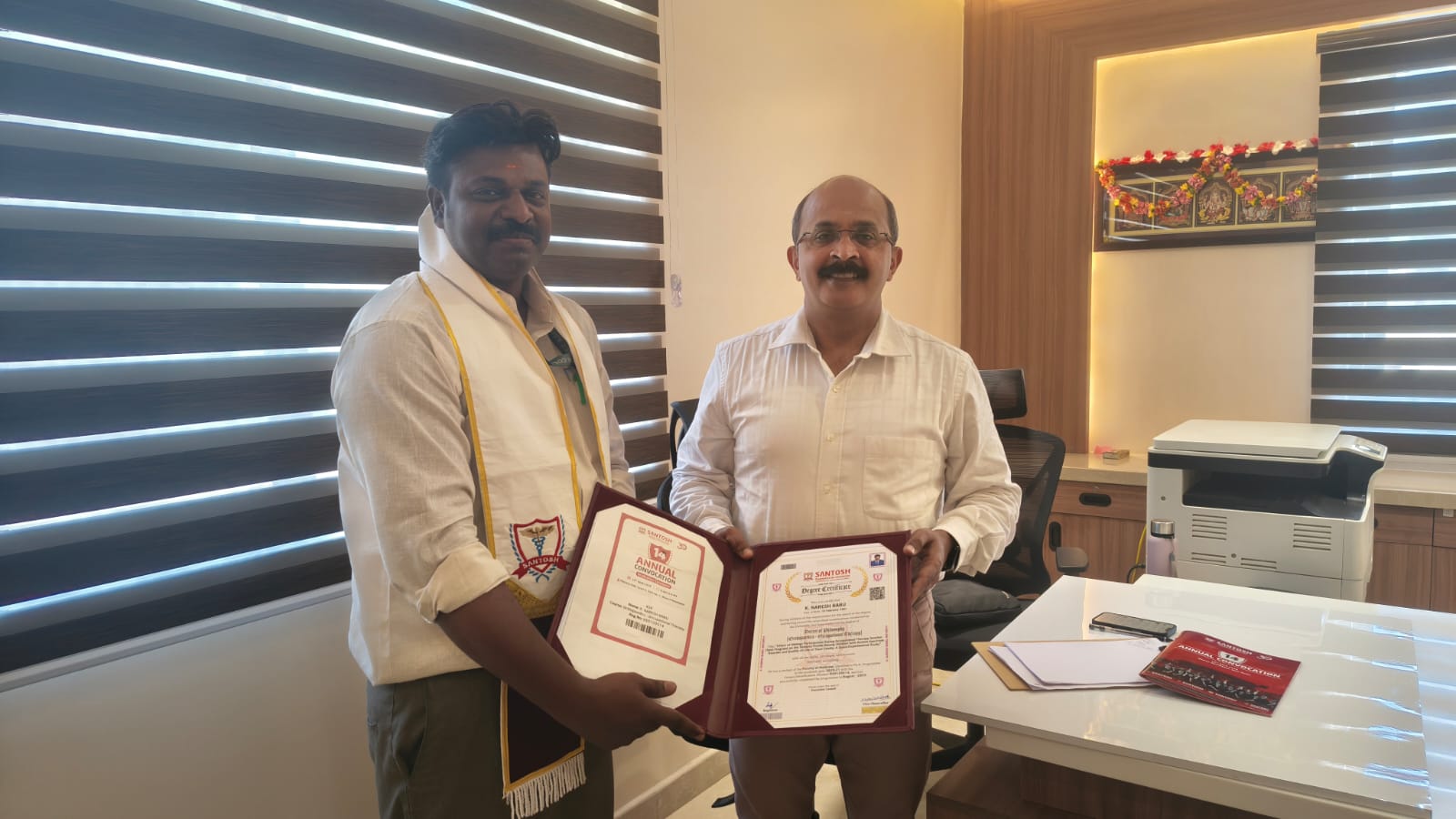 Our principal got awarded PhD OT